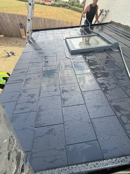 Finished conservatory roof from the garden end, with the roof window