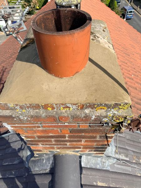 After: new smooth flaunching around the terracotta pot on the stack