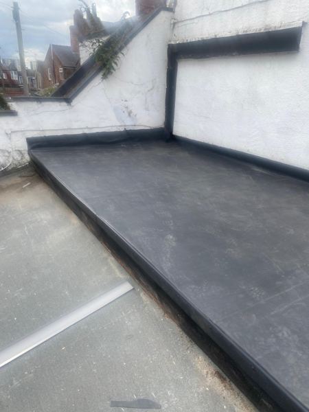 Finished EPDM rubber roof with upstands up both walls