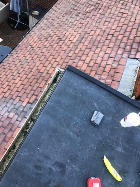 New rubber section with trims, tools still on the roof
