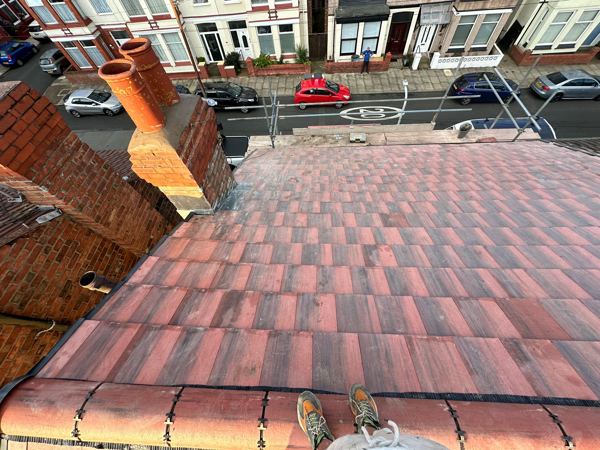 The new red tiled front slope and dry ridge, looking down to the street