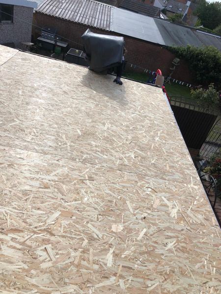 Fresh OSB decking across the roof before the membrane went on
