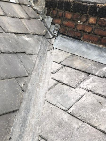 Top of the finished valley, lead flashing dressed against the brickwork