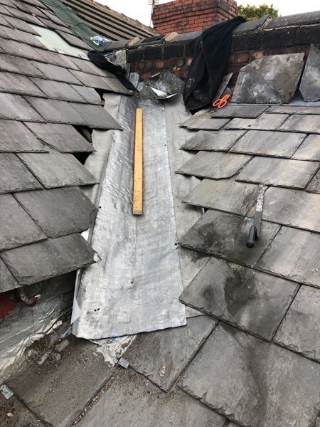 New lead sheet laid down the valley before the slates went back